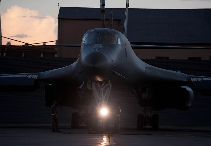Airmen assigned to the 28th Aircraft Maintenance Squadron perform pre-flight checks on a B-1 bomber at Ellsworth Air Force Base, S.D., July 24, 2012. The 28th AMXS manages the weapons loading and support activities to ensure the B-1 bomber fleet meets the 28th Bomb Wing’s flying requirements. (U.S. Air Force photo by Airman 1st Class Zachary Hada/Released)