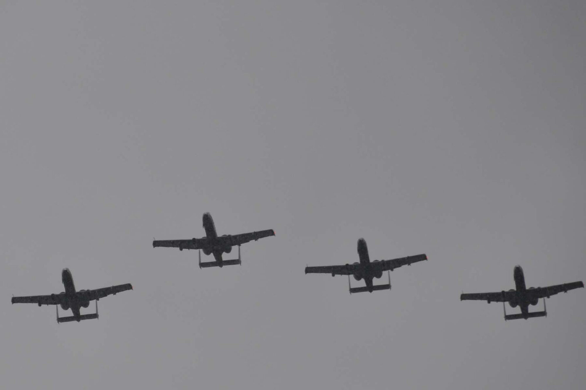 JOINT BASE PEARL HARBOR-HICKAM, Hawaii - Four A-10 Thunderbolt IIs from the 47th Fighter Squadron, Barksdale Air Force Base, La., conduct a fly-over during a heritage event celebrated by the unit July 21, 2012 at Joint Base Pearl Harbor-Hickam, Hawaii.  The event honored the legacy of the 47th FS which distinguished itself during the Japanese attack on Pearl Harbor, Hawaii in 1941.  The 47th FS is in Hawaii to take part in the Rim of the Pacific military exercise, the world largest international maritime military exercise.  It is held every two years and offers unique training opportunities for participating units.  (U.S. Air Force photo by Staff Sgt. Ted Daigle)