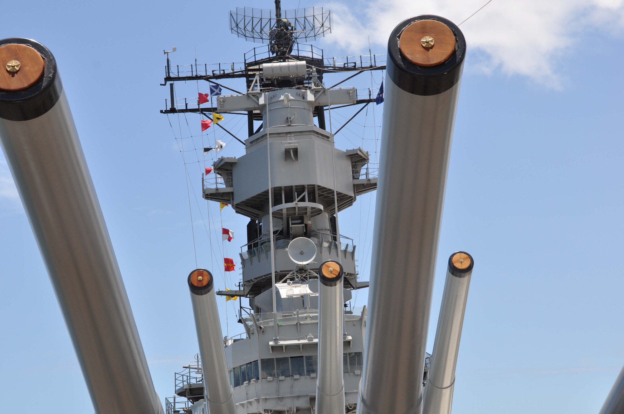JOINT BASE PEARL HARBOR-HICKAM, Hawaii - The 16-inch guns were part of the view enjoyed by Airmen during the 47th Fighter Squadron heritage event held on the deck of the U.S.S. Missouri July 21, 2012 at Joint Base Pearl Harbor-Hickam, Hawaii.  The 47th FS, Barksdale Air Force Base, La., held the event to emphasize the tradition of the unit which distinguished itself during the invasion of Pearl Harbor in 1941.  The 47th FS is in Hawaii participating in Rim of the Pacific military exercise.  RIMPAC is held every two years and is the world’s largest international maritime military exercise. (U.S. Air Force photo by Staff Sgt. Ted Daigle) 