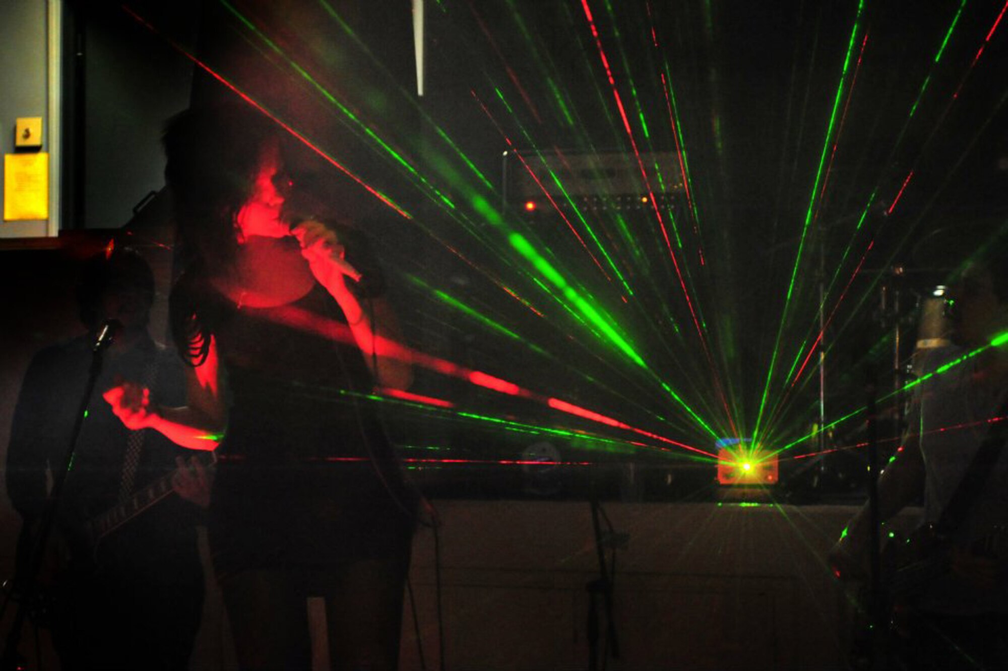 Elisabetha Rosnowski, Lost In Atlantis lead vocalist, performs live in the Drop Zone at Cannon Air Force Base, N.M., July 27, 2012. The EPIC Tour performance is part of a summer concert tour providing top-notch performances to military members across several states. (U.S. Air Force photo/Airman 1st Class Alexxis Pons Abascal) 