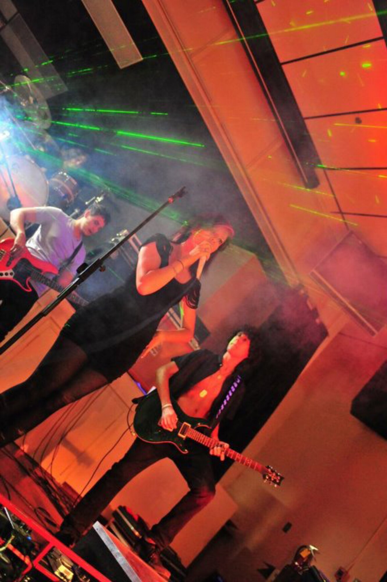 Elisabetha Rosnowski, Lost In Atlantis lead vocalist, performs live in the Drop Zone at Cannon Air Force Base, N.M., July 27, 2012. The EPIC Tour performance is part of a summer concert tour providing top-notch performances to military members across several states. (U.S. Air Force photo/Airman 1st Class Alexxis Pons Abascal) 