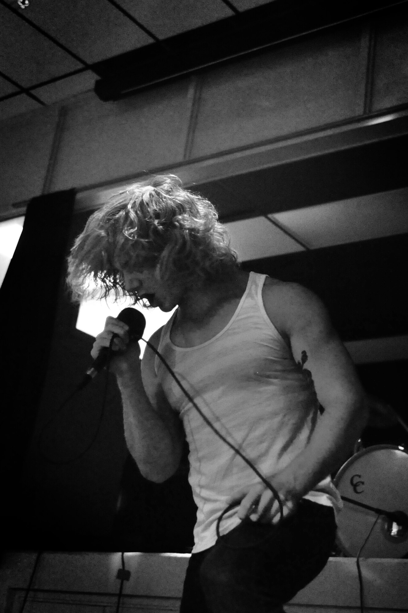 Phil Evans, School Boy Humor band member, performs live in the Drop Zone at Cannon Air Force Base, N.M., July 27, 2012. The EPIC Tour performance is part of a summer concert tour providing top-notch performances to military members across several states. (U.S. Air Force photo/Airman 1st Class Alexxis Pons Abascal) 