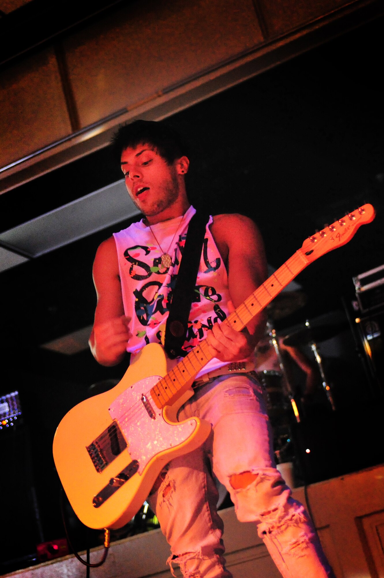 Anthony Evans, School Boy Humor band member, performs live in the Drop Zone at Cannon Air Force Base, N.M., July 27, 2012. The EPIC Tour performance is part of a summer concert tour providing top-notch performances to military members across several states. (U.S. Air Force photo/Airman 1st Class Alexxis Pons Abascal) 