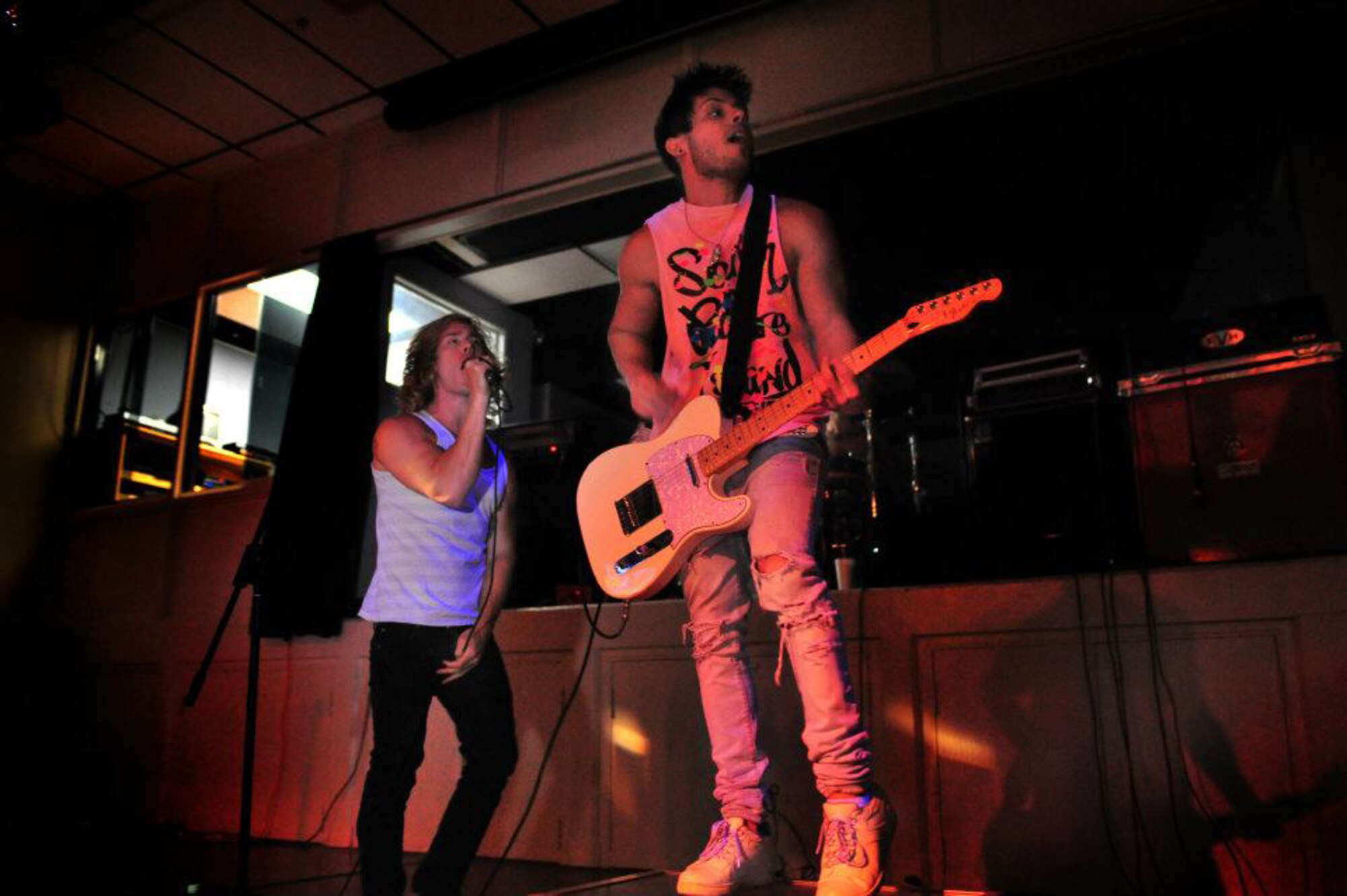 Phil and Anthony Evans, School Boy Humor band members, perform live in the Drop Zone at Cannon Air Force Base, N.M., July 27, 2012. The EPIC Tour performance is part of a summer concert tour providing top-notch performances to military members across several states. (U.S. Air Force photo/Airman 1st Class Alexxis Pons Abascal) 