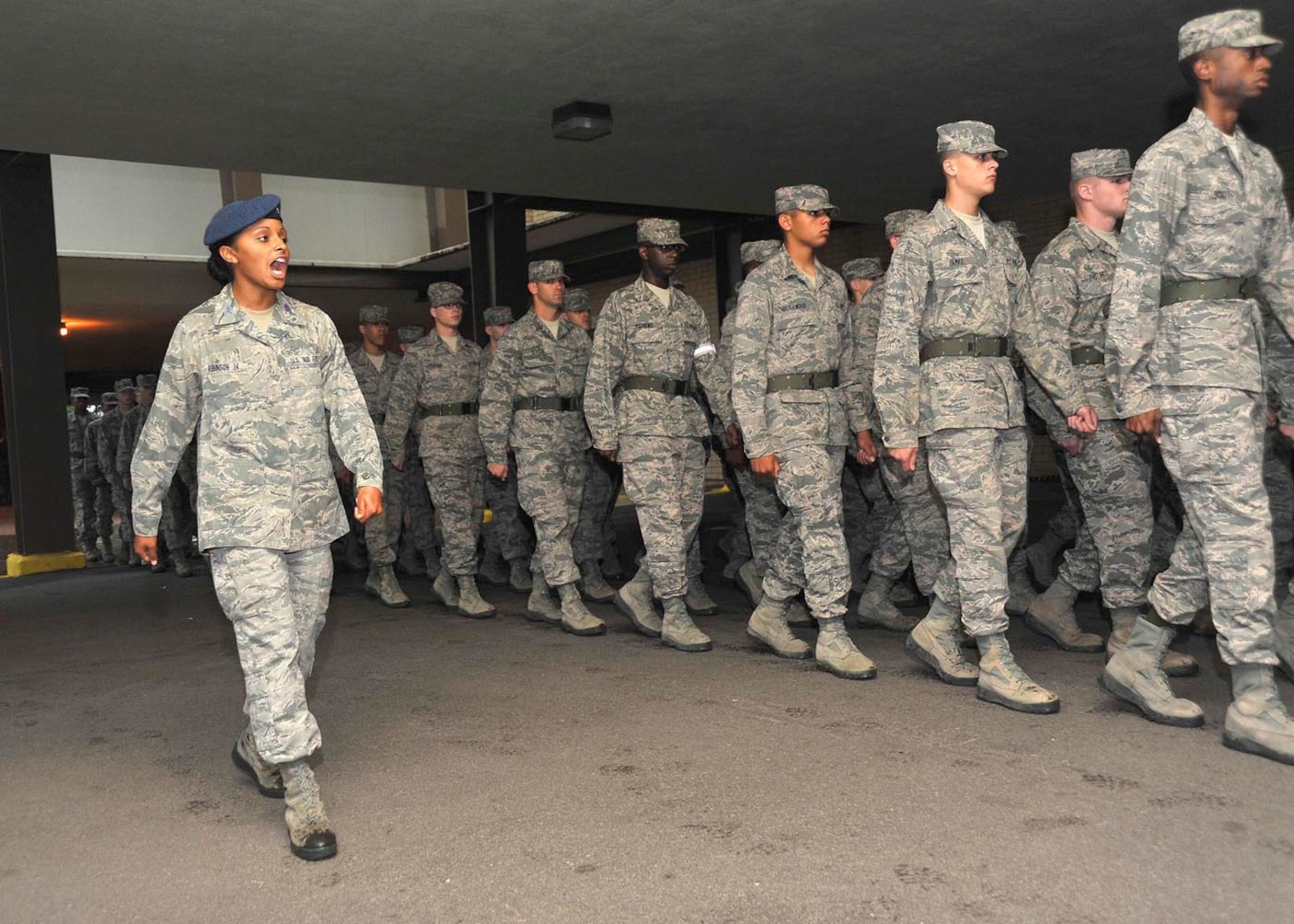 U.S. Air Force Academy cadet Nicque Robinson leads trainees from 323rd Training Squadron through column movements July 11. (U.S. Air Force photo/Alan Boedeker).