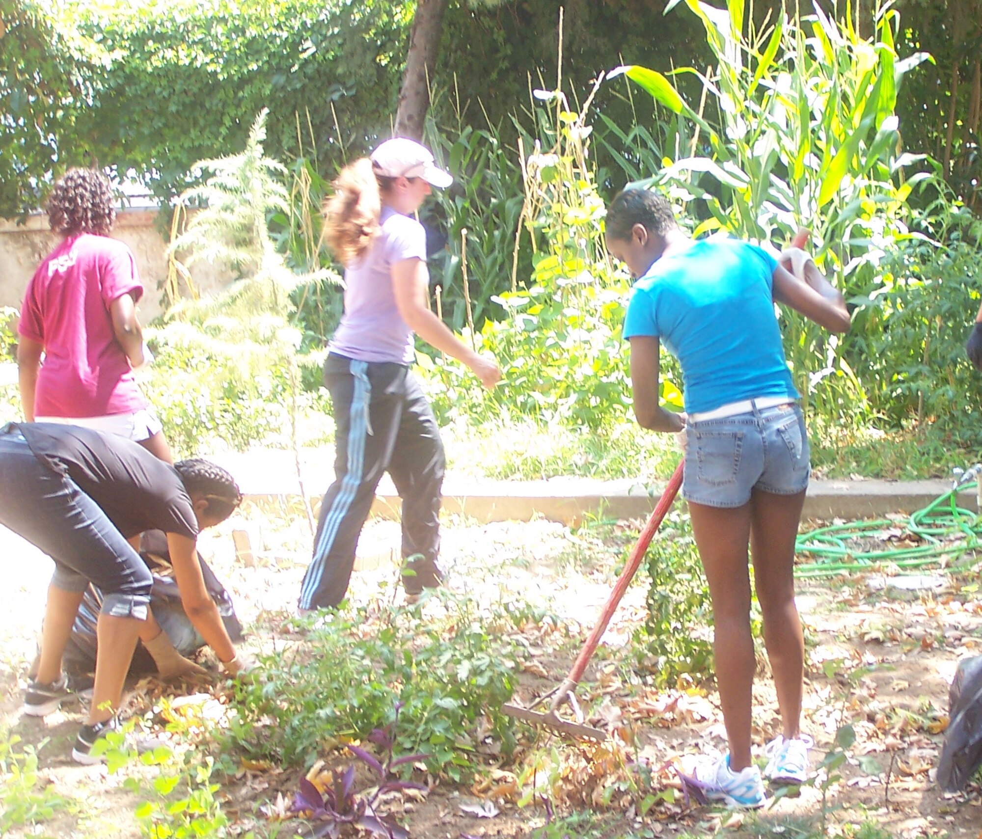 Airmen from the 916th Air Refueling Wing lend a hand at a local children's school in during their recent deployment. (USAF photo courtesy of SSgt. Kenya McCall, 90EARS)