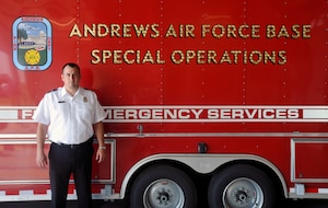 Mr. Jason Haddock, 11th Civil Engineer Squadron deputy fire chief and Air Force Civilian Program Specialist of the Year award recipient, poses for a photo outside Fire Station 1 on July 24, 2012. Haddock is one among 36,000 civilians currently working for the Air Force. (U.S. Air Force photo/Senior Airman Lindsey A. Porter)