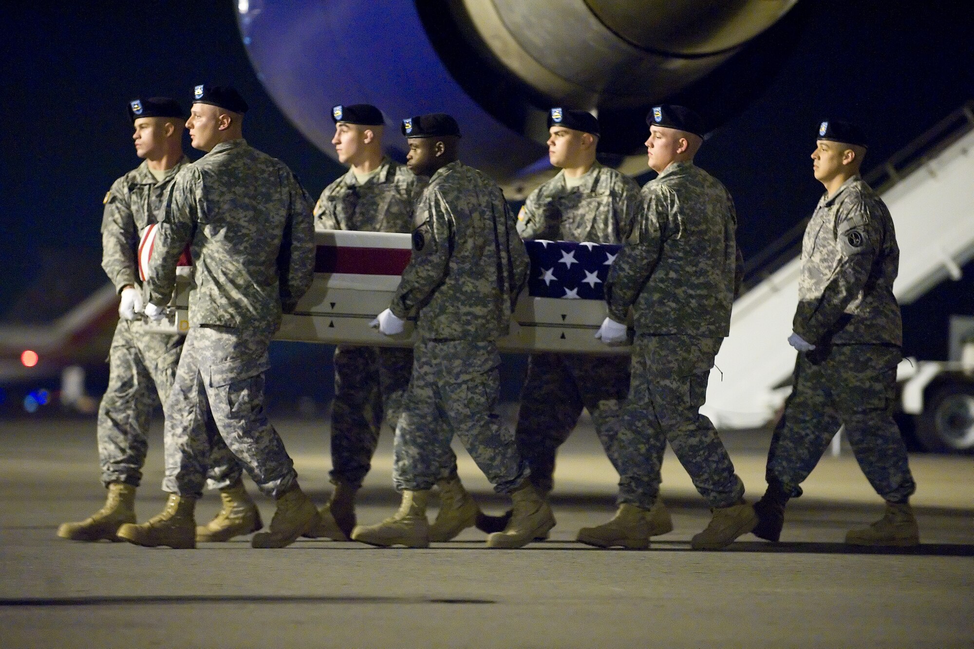 A U.S. Army carry team transfers the remains of Army 1st Lt. Sean R. Jacobs of Redding, Calif., at Dover Air Force Base, Del., July 29, 2012. (U.S. Air Force photo/Adrian R. Rowan)