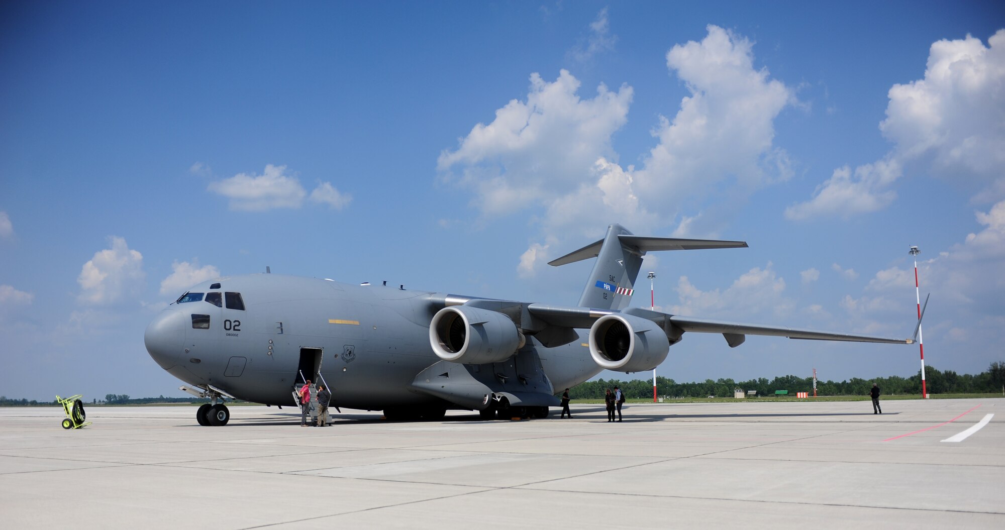 A C-17 Globemaster III prepares for take off at Papa Air Base, Hungary July 27. Papa AB is the home of Heavy Airlift Wing (HAW) operational unit of the Strategic Airlift Capability (SAC) program which is designed to fulfill the strategic airlift requirements of the following nations; Norway, Poland, Romania, Slovenia, Bulgaria, Estonia, Hungary, Lithuania, the Netherlands and USA and two Partnership for Peace (PFP) nations, Sweden and Finland. (U.S. Air Force Photo by Staff Sgt. Evelyn Chavez)