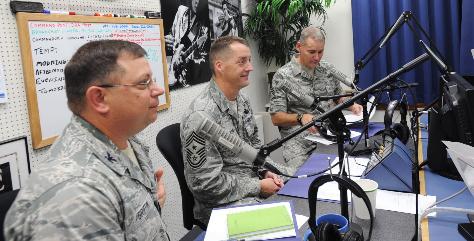 U.S. Air Force Chief Master Sgt. Douglas McIntyre, center, Command Chief Master Sergeant for the United States Forces Japan and Fifth Air Force, sat with Col. John Griffin, left, 35th Mission Support Group commander and Chief Master Sgt. James Laurent, 35th Fighter Wing command chief master sergeant, during the monthly Commanders Open Line radio show at Misawa Air Base, Japan, July 27, 2012. McIntyre spent three days touring the base, familiarizing himself with the facilities and Airmen and observing the good natured relationship between military and Japanese nationals. (U.S. Air Force Airman 1st Class Kenna Jackson/Released)