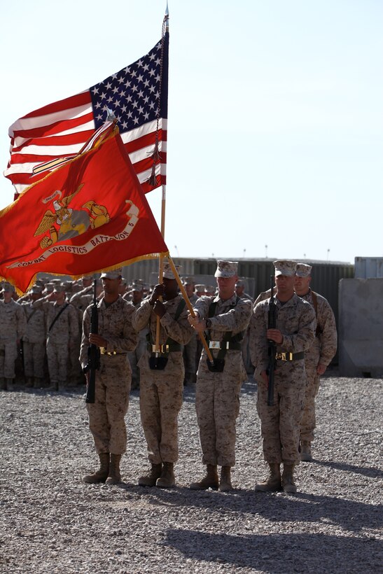The Combat Logistics Battalion 5, 1st Marine Logistics Group (Forward) color guard presents their battle colors during a casing of the colors ceremony at Camp Dwyer, Afghanistan, July 30. Since their arrival in April, Marines and sailors with CLB-5 conducted daily combat logistics patrols to multiple forward operating bases, patrol bases and combat outposts.