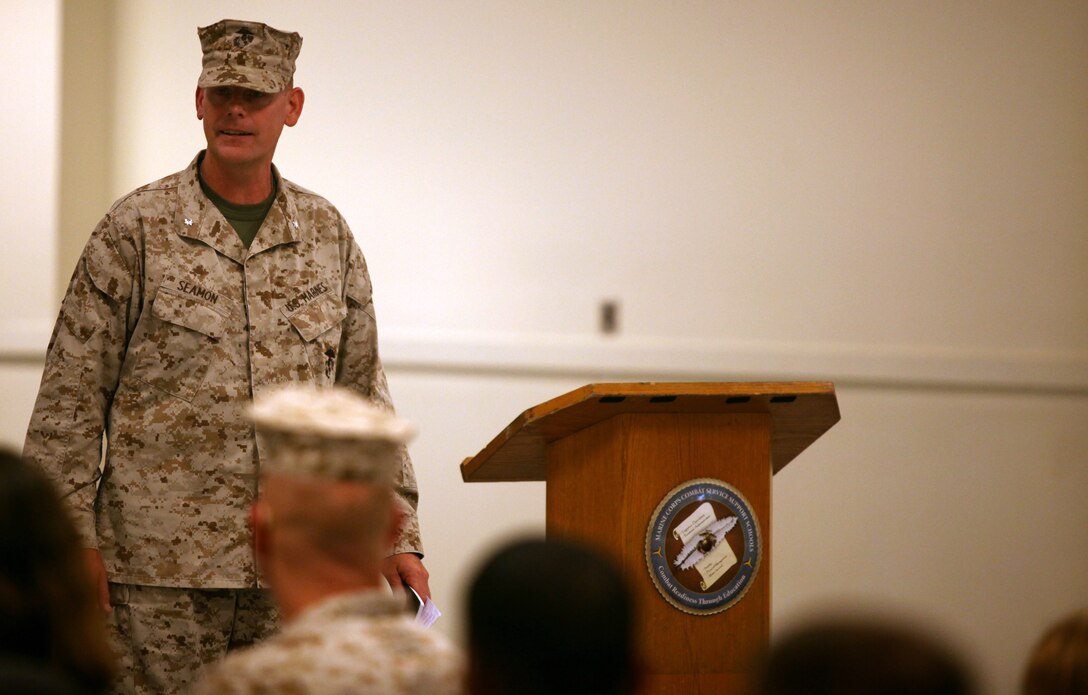 Lt. Col. Timothy B. Seamon, outgoing commander of Marine Corps Combat Service Support Schools, thanks many different people he worked with during his time as the commanding officer of MCCSSS during a change of command ceremony aboard Camp Johnson July 31. Seamon relinquished command of MCCSSS to Lt. Col. Paul F. Bertholf after serving as the unit’s CO since April.