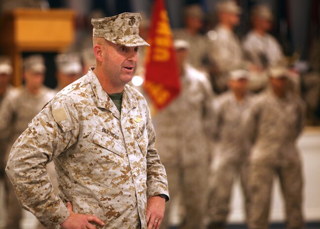 Lt. Col. Paul F. Bertholf, incoming commanding officer of Marine Corps Combat Service Support Schools, speaks after the official change of command during the ceremony aboard Camp Johnson July 31. Lt. Col. Timothy B. Seamon relinquished command of MCCSSS to Bertholf after serving as the unit’s commanding officer since April. (Official Marine Corps photo by Lance Cpl. Scott W. Whiting) 