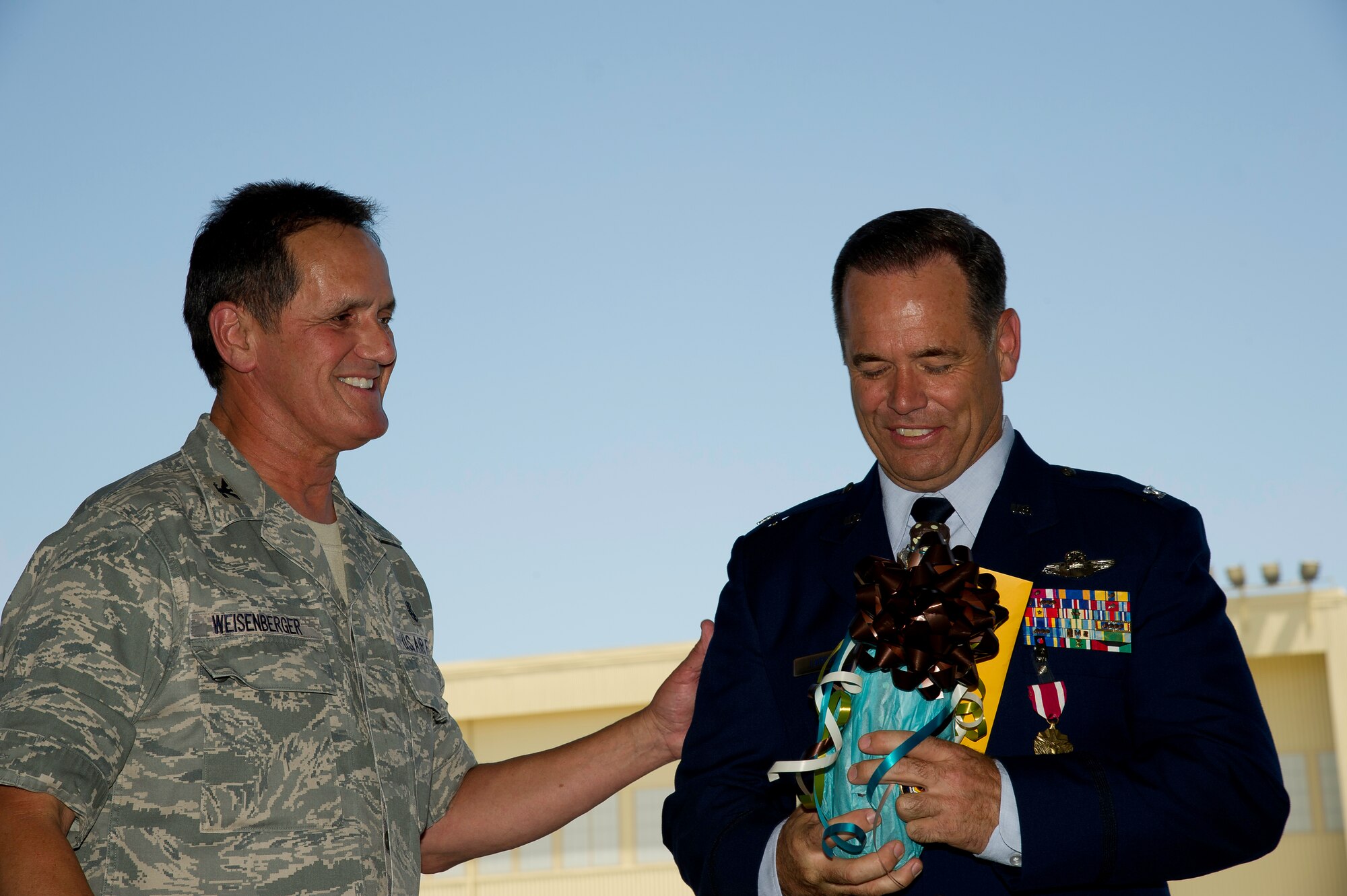 Col Mark Larson's promotion and farewell on July 21. (U.S. Air Force photo by Staff Sgt. Matthew Smith) 

