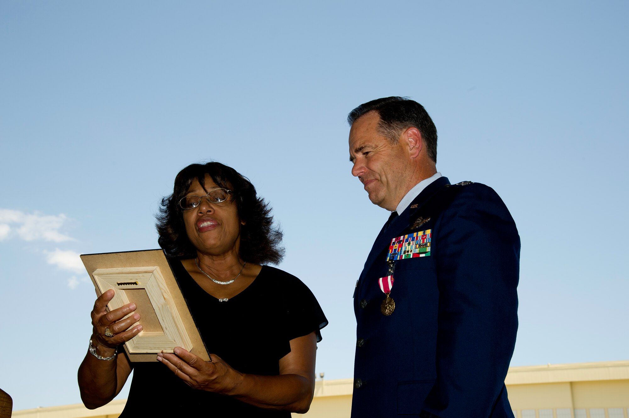 Col Mark Larson's promotion and farewell on July 21. (U.S. Air Force photo by Staff Sgt. Matthew Smith) 

