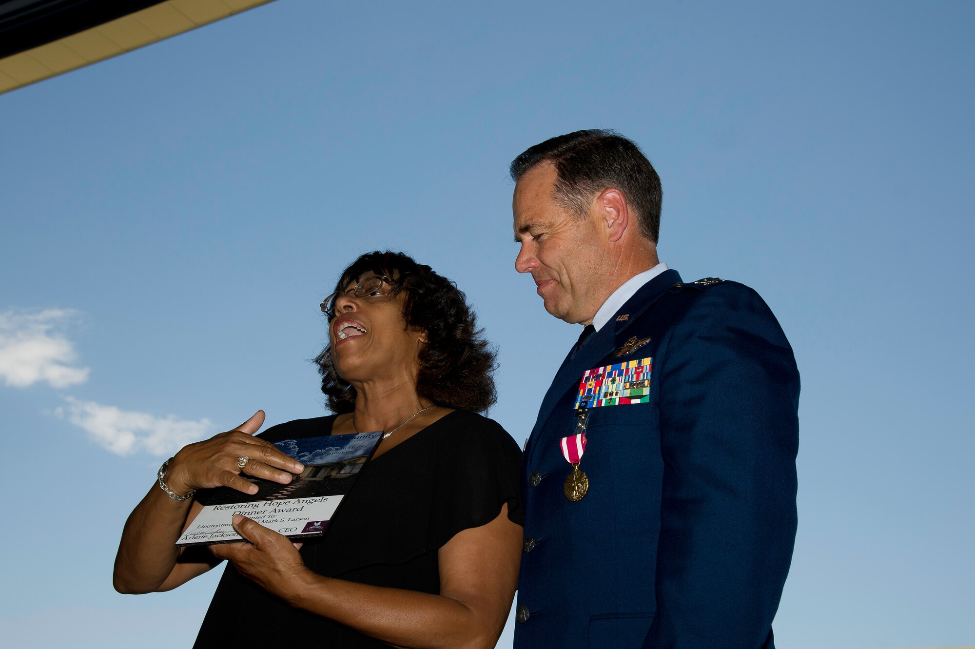 Col Mark Larson's promotion and farewell on July 21. (U.S. Air Force photo by Staff Sgt. Matthew Smith) 

