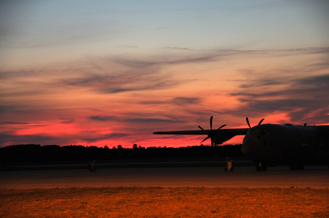 A C-130 Hercules sits on the flight line at Alpena Combat Readiness Training Center, Michigan, July 21, 2012 where the 125th Air Expeditionary Wing is participating in an Operational Readiness Inspection. Inspections such as these ensure Airmen are current, qualified, and ready to fight. (U.S. Air Force photo by Senior Airman Jessica Mae Snow) 