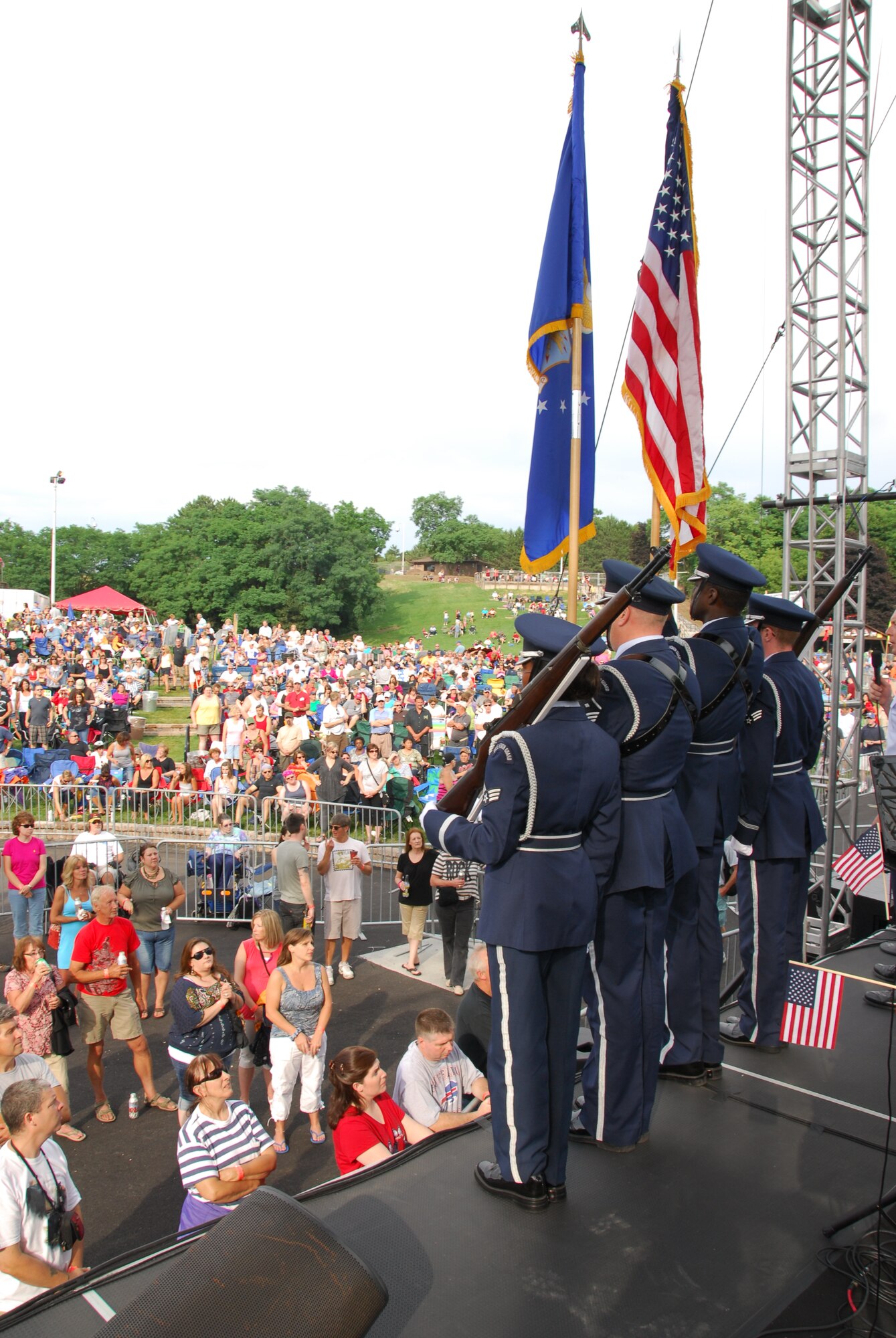 Members of the 914th Airlift Wing Base Honor Guard present the colors during the opening of Huey Lewis and the News in Lewiston, NY, July 3, 2012. Artpark was celebrating Military Appreciation Nght during their Outdoor Concert Series. (U.S. Air Force photo by Senior Airman Ron Dombkowski)