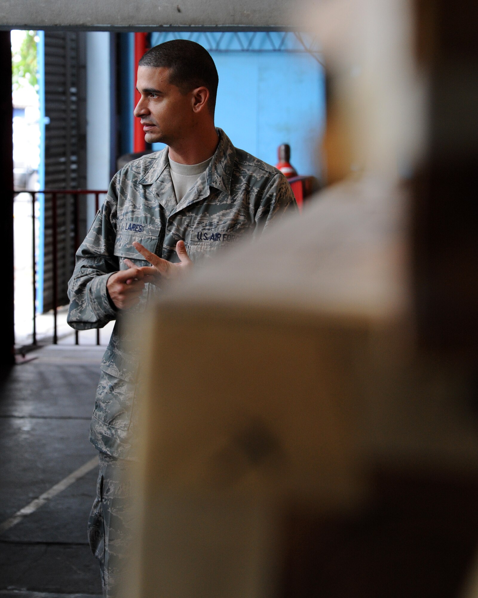 Tech. Sgt. Jason Lares, a Supply Technician with the 571st Mobility Support Advisory Squadron, works with Honduran Airmen in Tegucigalpa, Honduras exchanging knowledge relating to how the U.S. Air Force and Honduran Air Force handle their supply chain process.  Over the next 30 days Lares and Sierra will continue trading ideas and experiences while working together to build relationships and partner capacity between the U.S. and Honduran air forces.  (U.S. Air Force photo/Staff Sgt. James Stewart)