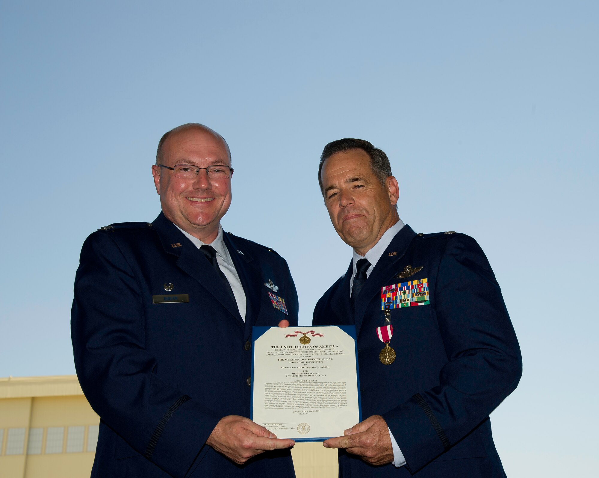 Col Mark Larson's promotion and farewell on July 21. (U.S. Air Force photo by Staff Sgt. Matthew Smith) 

