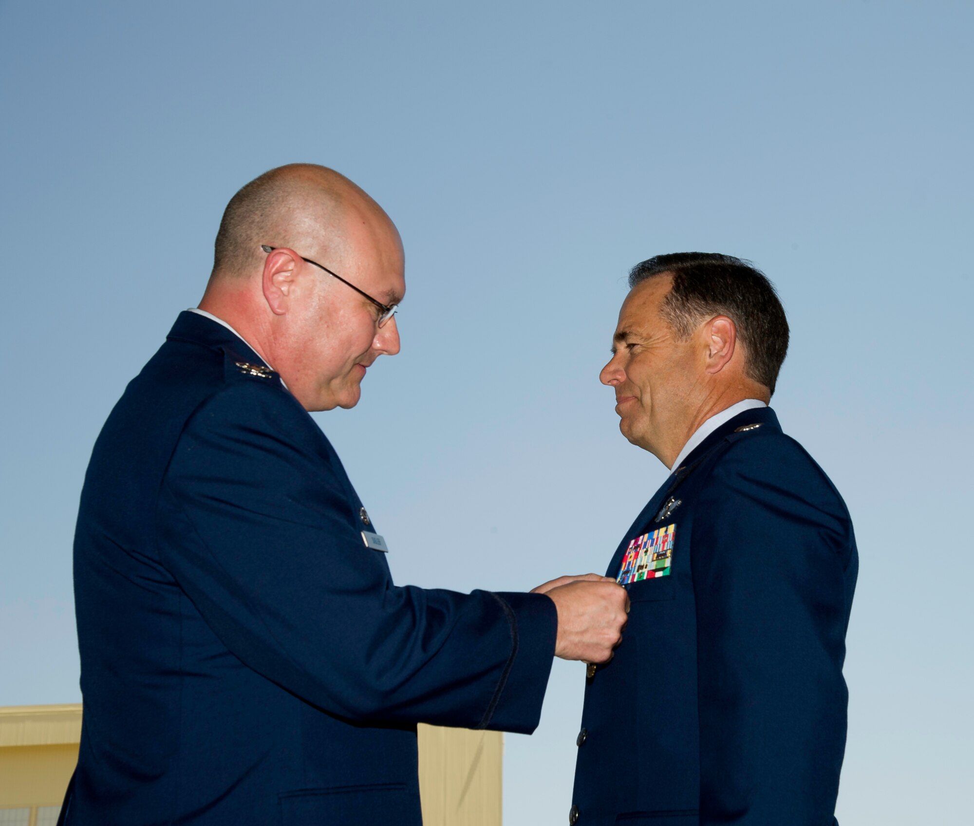 Col Mark Larson's promotion and farewell on July 21. (U.S. Air Force photo by Staff Sgt. Matthew Smith) 

