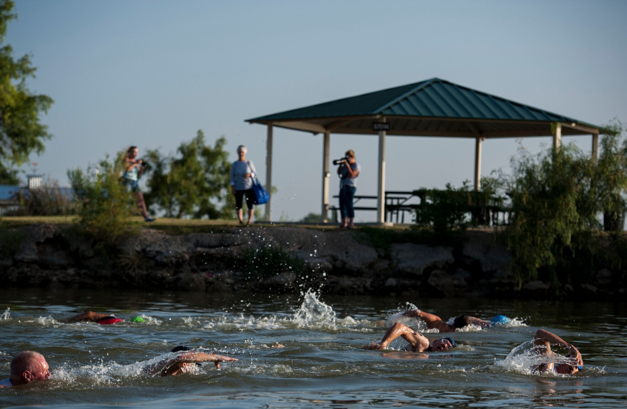 GOODFELLOW AIR FORCE BASE, Texas-- Goodfellow Triathlon participants swim in Lake Nasworthy July 28. The triathlon, open to military and the community, was comprised of a 400-meter swim, 20-kilometer bike ride, and a 5-kilometer run. (U.S. Air Force photo/Airman 1st Class Michael Smith)