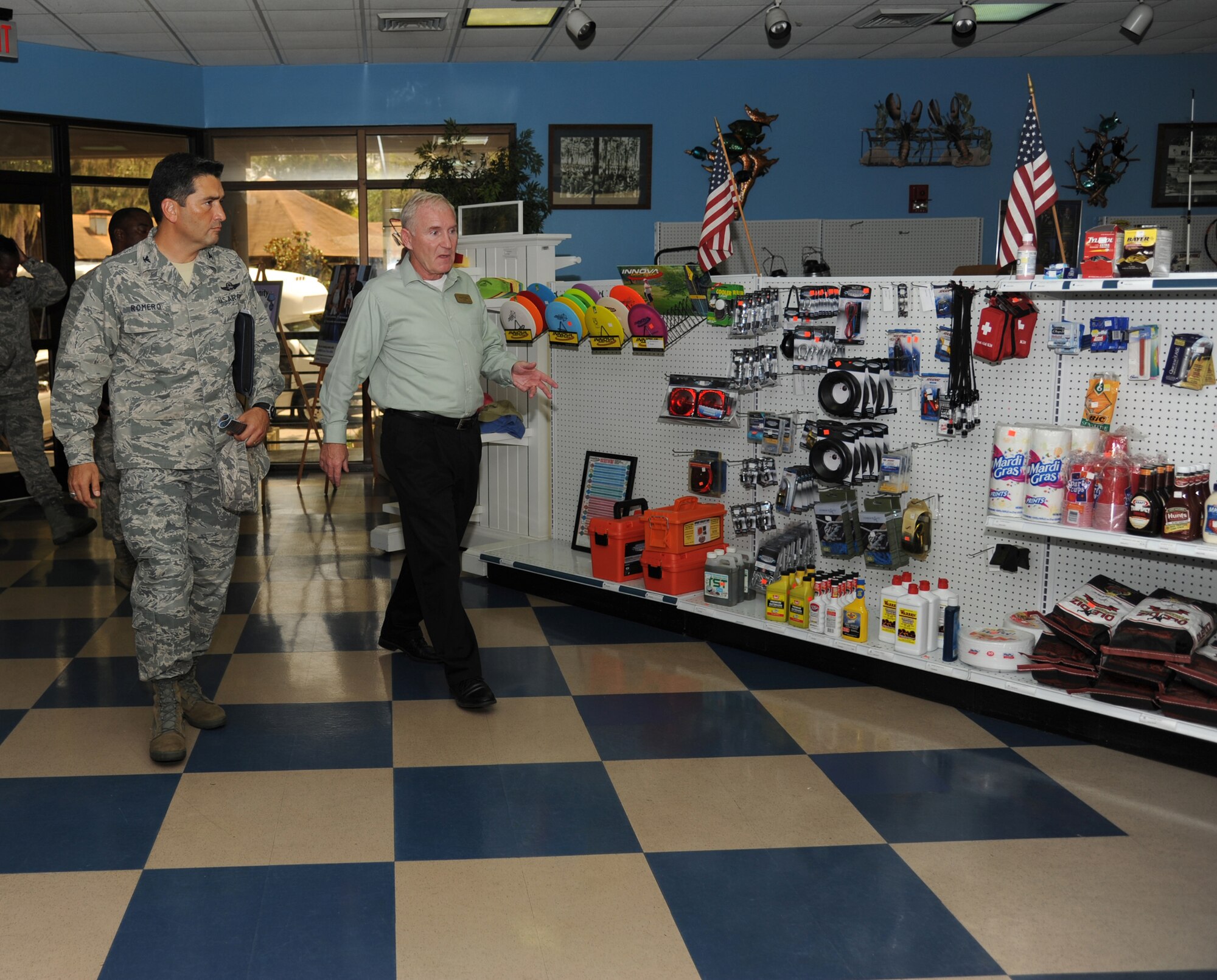 Col. Rene Romero, 81st Training Wing vice commander, receives a tour of the Outdoor Recreation facility, by Tom Golden, 81st Force Support Squadron, during a one-day immersion tour of the 81st Mission Support Group, July 24, 2012, Keesler Air Force Base, Miss.  (U.S. Air Force photo by Kemberly Groue)