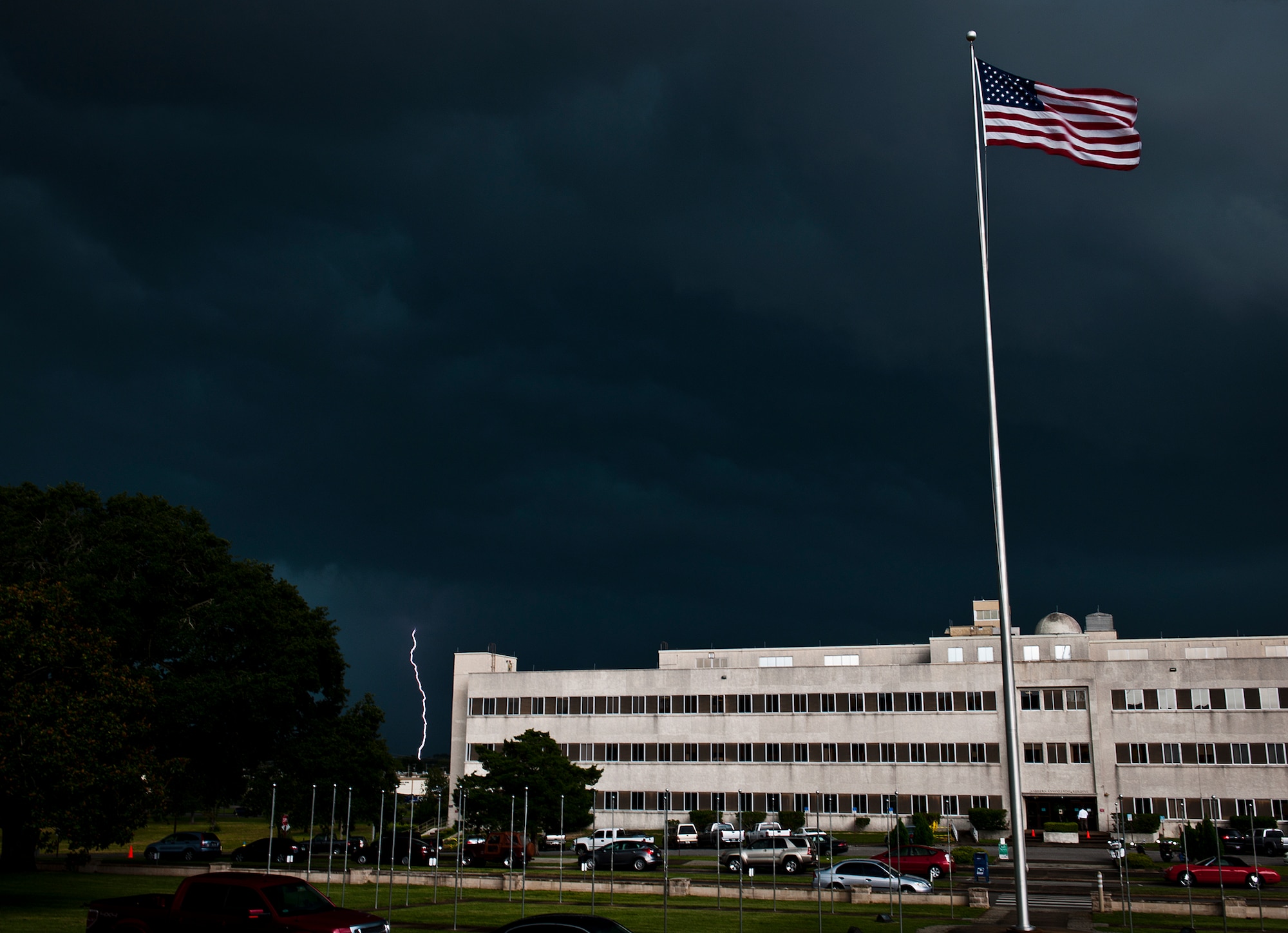 A large-scale summer storm moves toward Eglin Air Force Base, Fla., July 30, bringing winds, rain and lightning.  The thunderstorm moved in from the Southeast and drenched the base for an hour and a half late in the day.  A similar storm rolled through the morning of July 31 as well.  (U.S. Air Force photo/Samuel King Jr.)