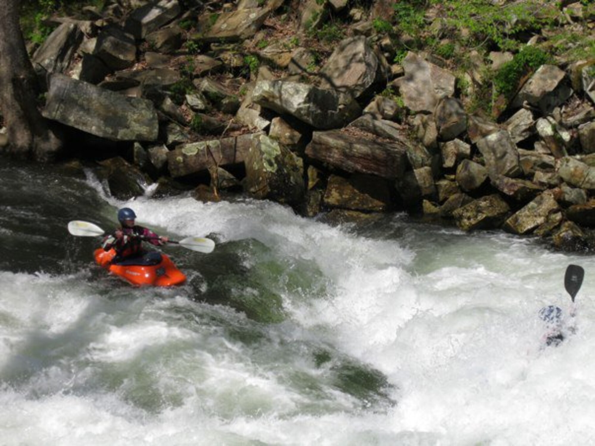 Kellie Matack fights rapids during a Team River Runners event. TRR uses the Peterson aquatics center after hours to help wounded servicemembers regain a sense of self and experience independence again through paddling sports. (Courtesy photo)