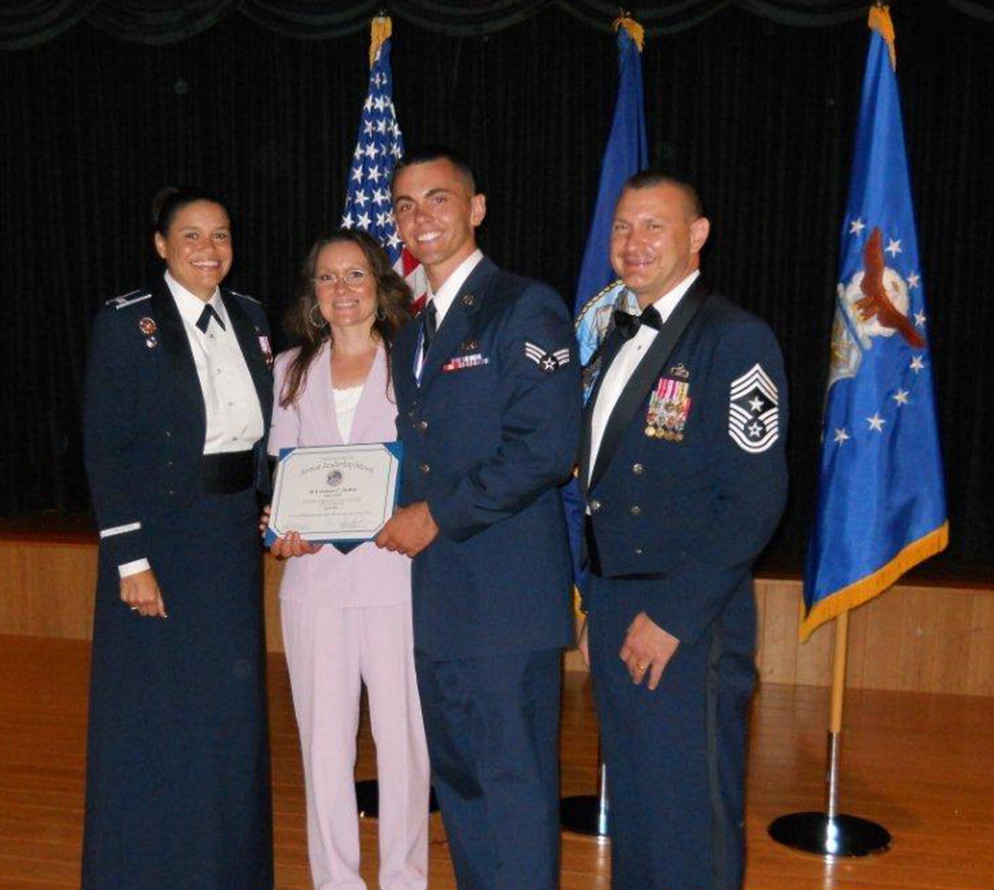 WRIGHT-PATTERSON AIR FORCE BASE, Ohio - Senior Airman Joshua DeWitt, 445th Aircraft Maintenance Squadron aircraft electro/environmental systems specialist, had a memorable night when he not only graduated from the Wright-Patterson Air Force Base Airman Leadership School June 28 but he also earned the Distinguished Graduate award. (Courtesy photo)