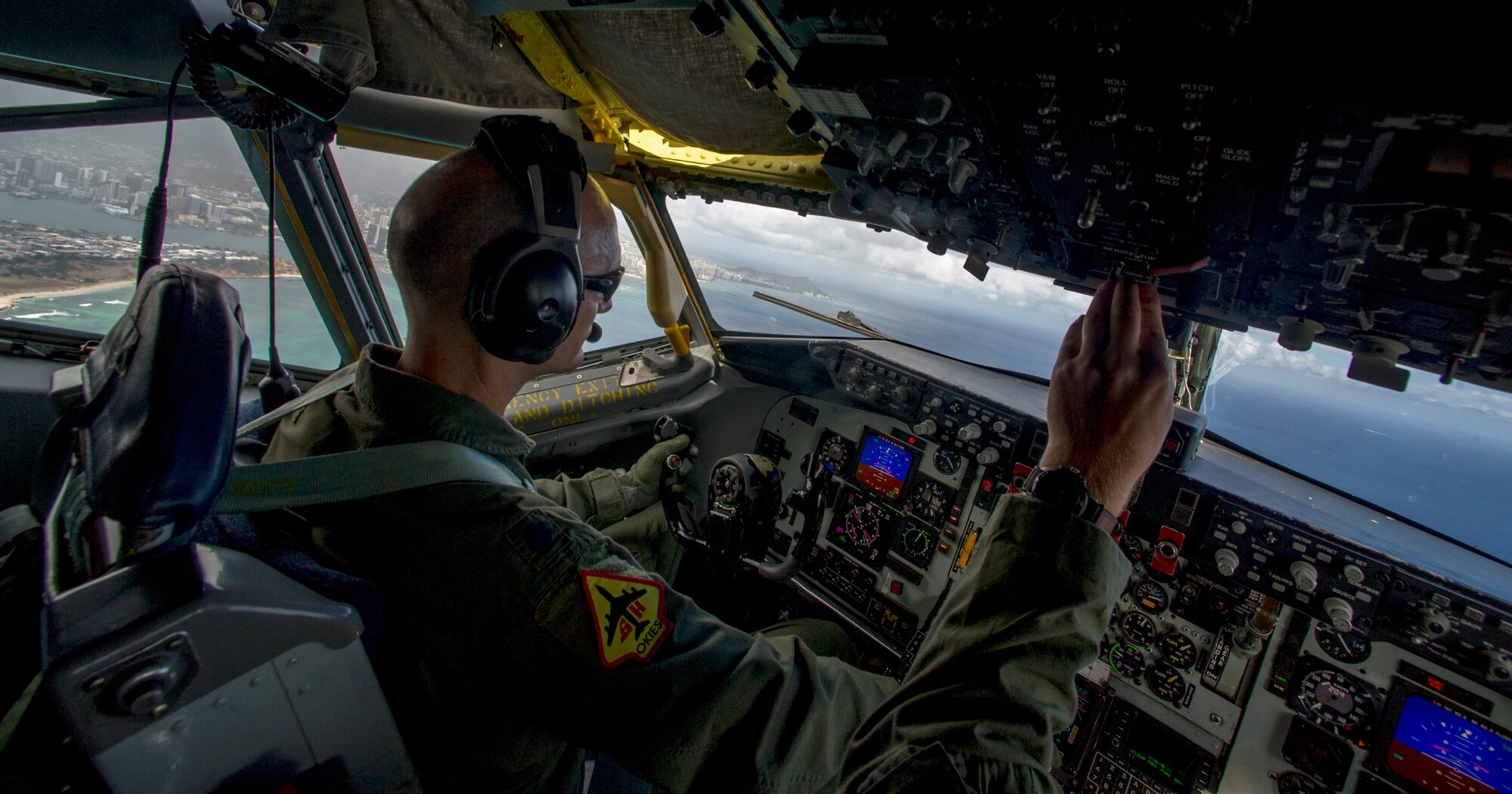 Lieutenant Colonel Tom Hudnall, a pilot with the 465th Air Refueling Squadron, Tinker Air Force Base, Okla., takes off from Joint Base Pearl Harbor-Hickam, Hawaii in a KC-135 Stratotanker during Rim of the Pacific exercise, July 24, 2012. Twenty-two nations, more than 40 ships and submarines, more than 200 aircraft and 25,000 personnel are in RIMPAC exercise from June 29 to Aug. 3, in and around the Hawaiian Islands. The world's largest international maritime exercise, RIMPAC provides a unique training opportunity that helps participants foster and sustain the cooperative relationships that are critical to ensuring the safety of sea lanes and security on the world's oceans. RIMPAC 2012 is the 23rd exercise in the series that began in 1971. (U.S. Air Force photo by Tech. Sgt. Bradley C. Church)