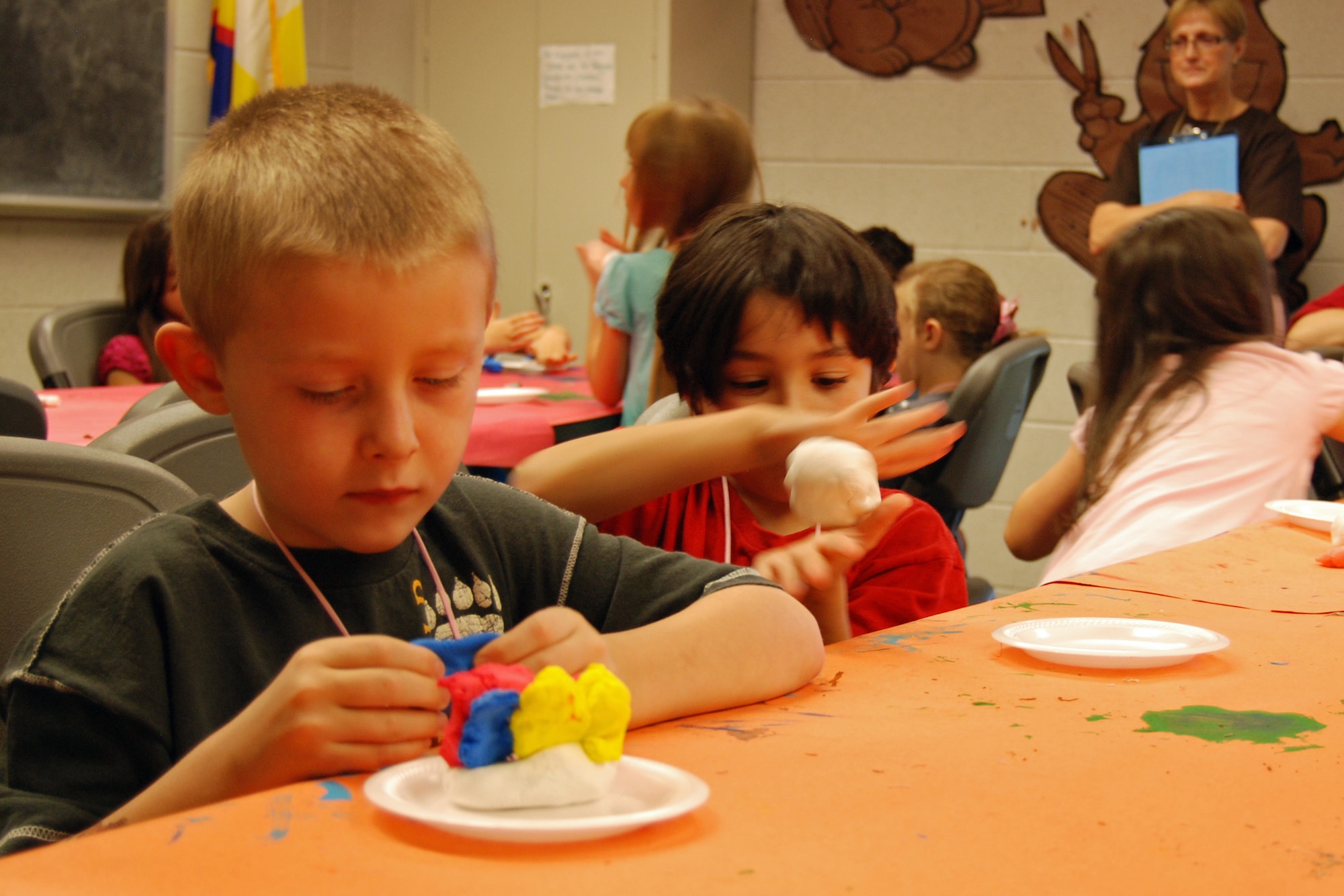 Zack (left) and Eden work with clay during craft time at the Peterson Vacation Bible School. This year’s VBS ran July 9-13 and was based on the scripture Phillipians 4:19. (U.S. Air Force photo/Lea Johnson)