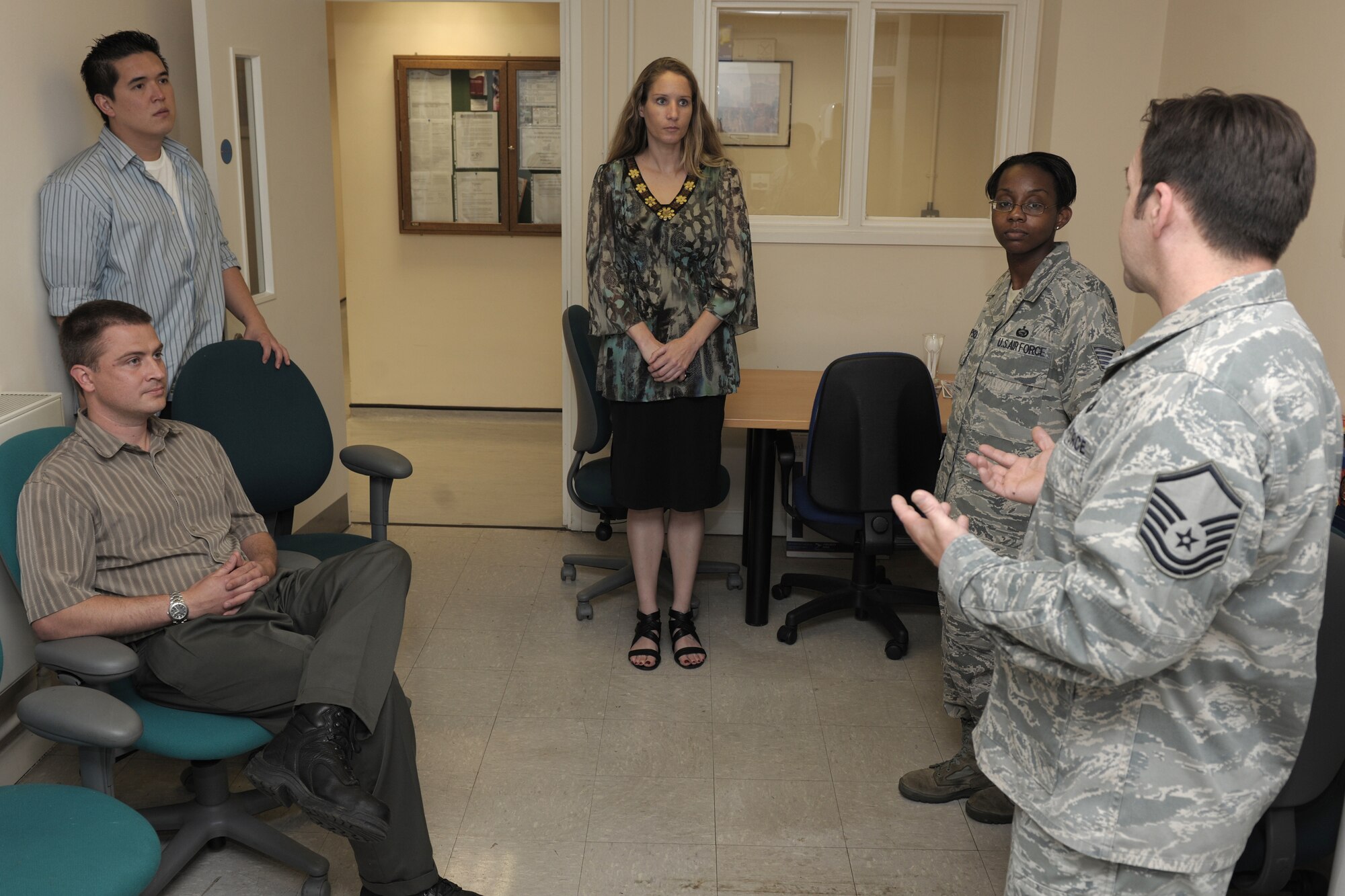 LONDON – Master Sgt. Michael Clackum, 423 Force Support Squadron Career Assistance Advisor, and Tech. Sgt. Maria Simpson, 501st Combat Support Wing Equal Opportunity director, perform a site visit with the 422nd Communications Squadron Blenheim Crescent Post Office in London July 11. The Blenheim Crescent Post Office in London serves American Personnel stationed in London. (U.S. Air Force photo by Master Sgt. John Barton)