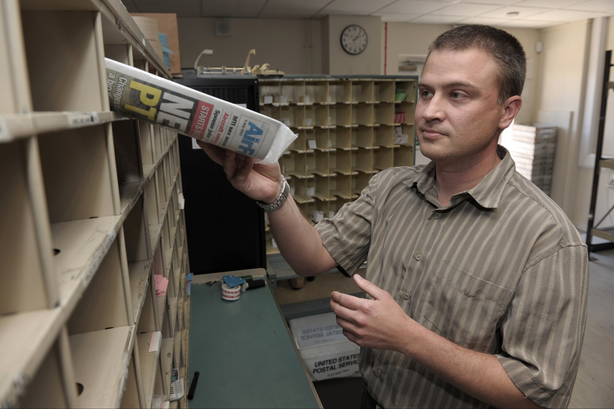 LONDON – Tech. Sgt. Douglas Chilson, 422nd Communications Squadron Blenheim Crescent Post Office in London, distributes mail in customers box’s July 11. The Blenheim Crescent Post Office in London serves American Personnel stationed in London. (U.S. Air Force photo by Master Sgt. John Barton)