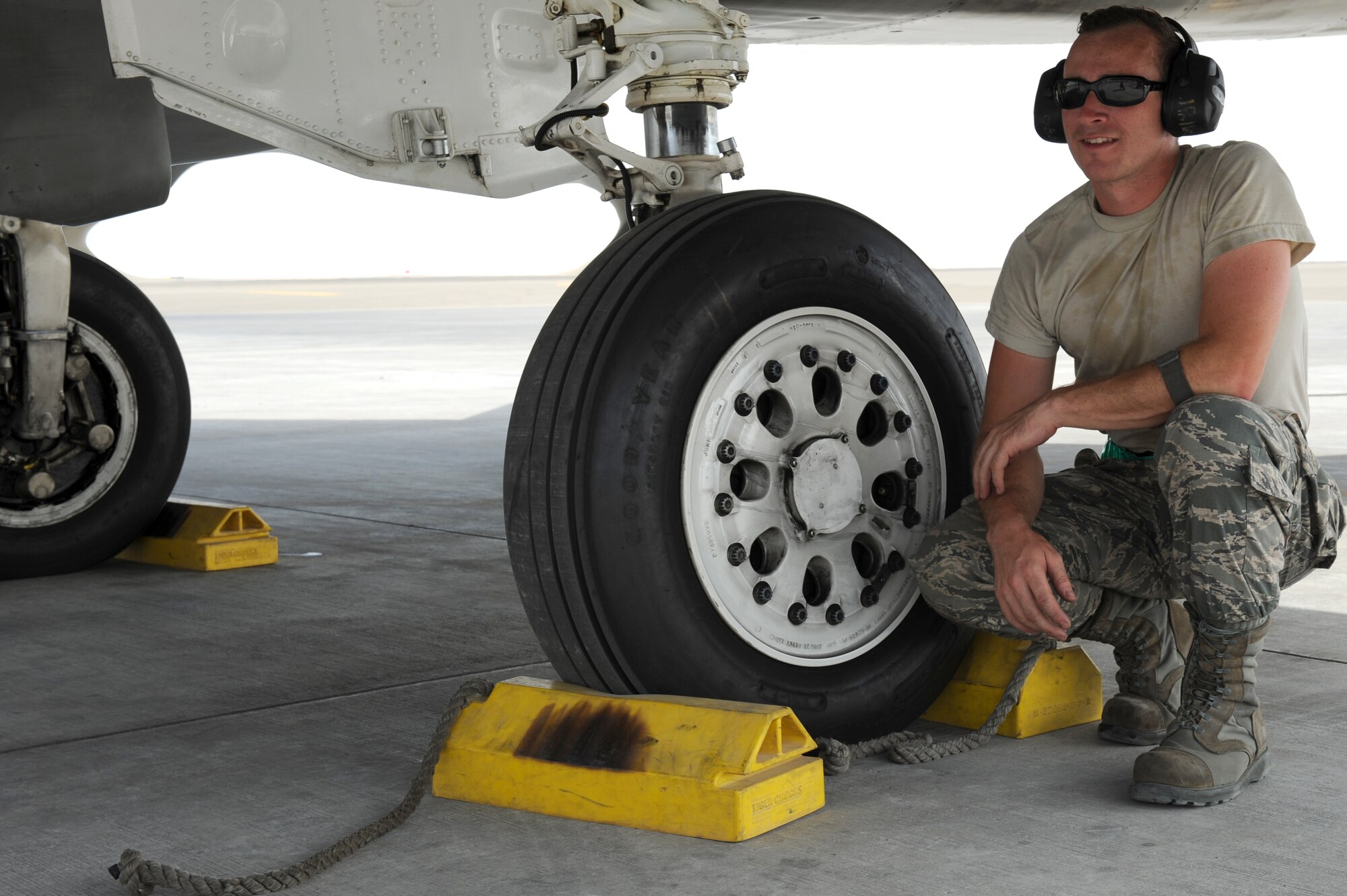 SOUTHWEST ASIA - U.S. Air Force Airman 1st Class Travis Pollet, 380th Expeditionary Aircraft Maintenance Squadron crew chief, awaits the order to pull chocks July 30, 2012. Pollet, a Mandeville, La., native, is a member of the Louisiana Air National Guard. (U.S. Air Force photo/Master Sgt. Scott MacKay)