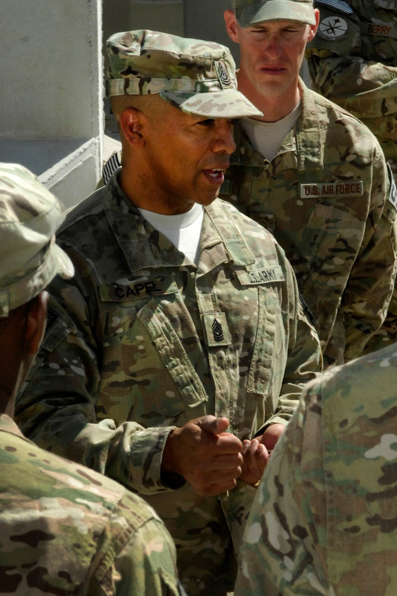 Command Sgt. Maj. Thomas Capel, International Security Assistance Force senior enlisted advisor, speaks with Airmen of the 455th Expeditionary Security Forces Squadron during his visit to Bagram Airfield, Afghanistan, July 27, 2012. Capel spoke to Airmen about future operations and thanked them for their contributions in support of ongoing missions in Afghanistan. (U.S. Air Force photo/SSgt Jeff Nevison)