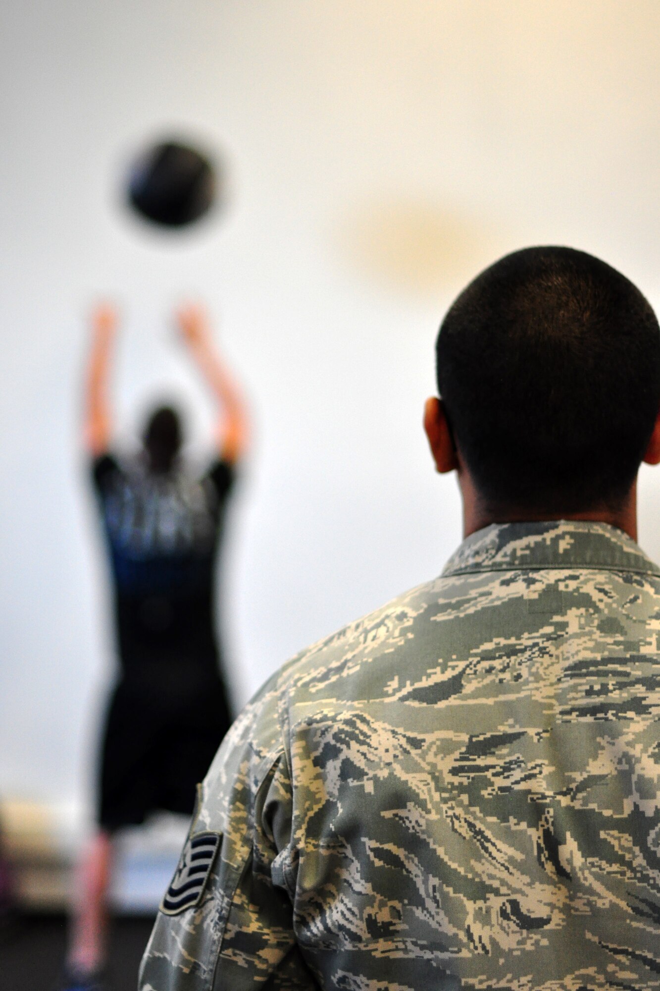 Tech. Sgt. David Garcia (right), 86th Medical Operations Squadron physical therapy technician, watches Senior Airman Kaleb Salazar, 86th Vehicle Readiness Squadron fire truck maintenance, form during an advanced physical therapy class at Ramstein Air Base, Germany, July 26, 2012. The three-week class is specially designed for those who are going back to some of the more physically demanding Air Force career fields and it’s used to ensure they have proper form to avoid re-injury at work or during their leisure activities. (U.S. Air Force photo/Tech. Sgt. Chad Thompson)