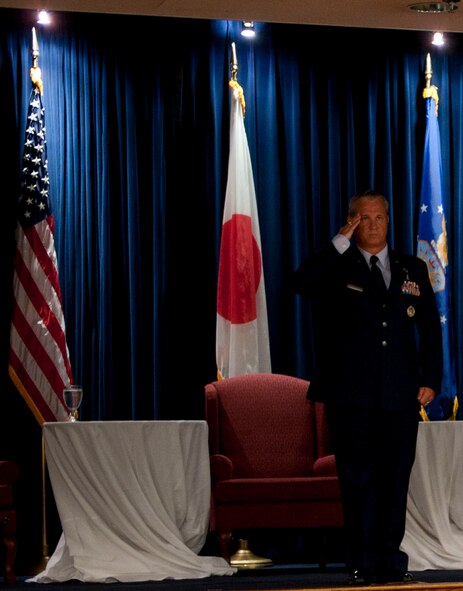 YOKOTA AIR BASE, Japan -- Maj. Randy Claxton, 374th Medical Operations Squadron incoming commander, salutes his squadron for the first time during the 374 MDOS change of command ceremony at Yokota Air Base, Japan, July 30, 2011. Claxton served as Chief, Medical Current Operation for the office of the Air Force Surgeon General at the Pentagon in Washington. (U.S. Air Force photo by Airman 1st Class Krystal M. Garrett) 