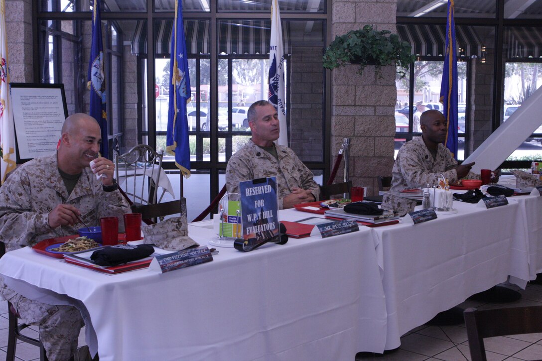 Maj. Gen. William Pendleton Thompson Hill evaluators taste food during the Best of the West competition at Gonzales Hall aboard Marine Corps Air Station Miramar, Calif., July 31. The judges tasted food samples; however, the winners of the competition will not be announced for multiple weeks.
