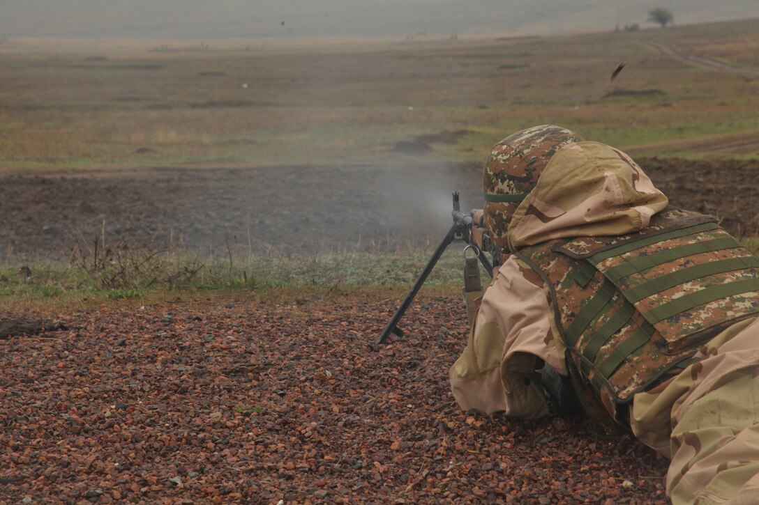 An Armenian soldier fires his machine gun on Babadag Training Area. The live-fire ranges were part of a nine-day combined training which also included Marines from Black Sea Rotational Force 12 and soldiers from Macedonia. ::r::::n::