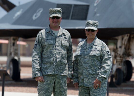 HOLLOMAN AIR FORCE BASE, N.M. – Master Sgt. Garret Dow, 49th Civil Engineer Squadron emergency management superintendent, and Tech. Sgt. Dow, 29th Attack Squadron aviation resource management flight chief, pose for a photo at Heritage Park June 1. Over Memorial Day weekend, the Dows saved a man’s life from a sinking boat at Elephant Butte Reservoir, near Truth or Consequences, N.M. The Dows, who have been stationed at Holloman AFB for two years, go to Elephant Butte three times a month, but have never experienced any situation like the one they did May 26. (U.S. Air Force photo by Airman 1st Class Siuta B. Ika/Released)