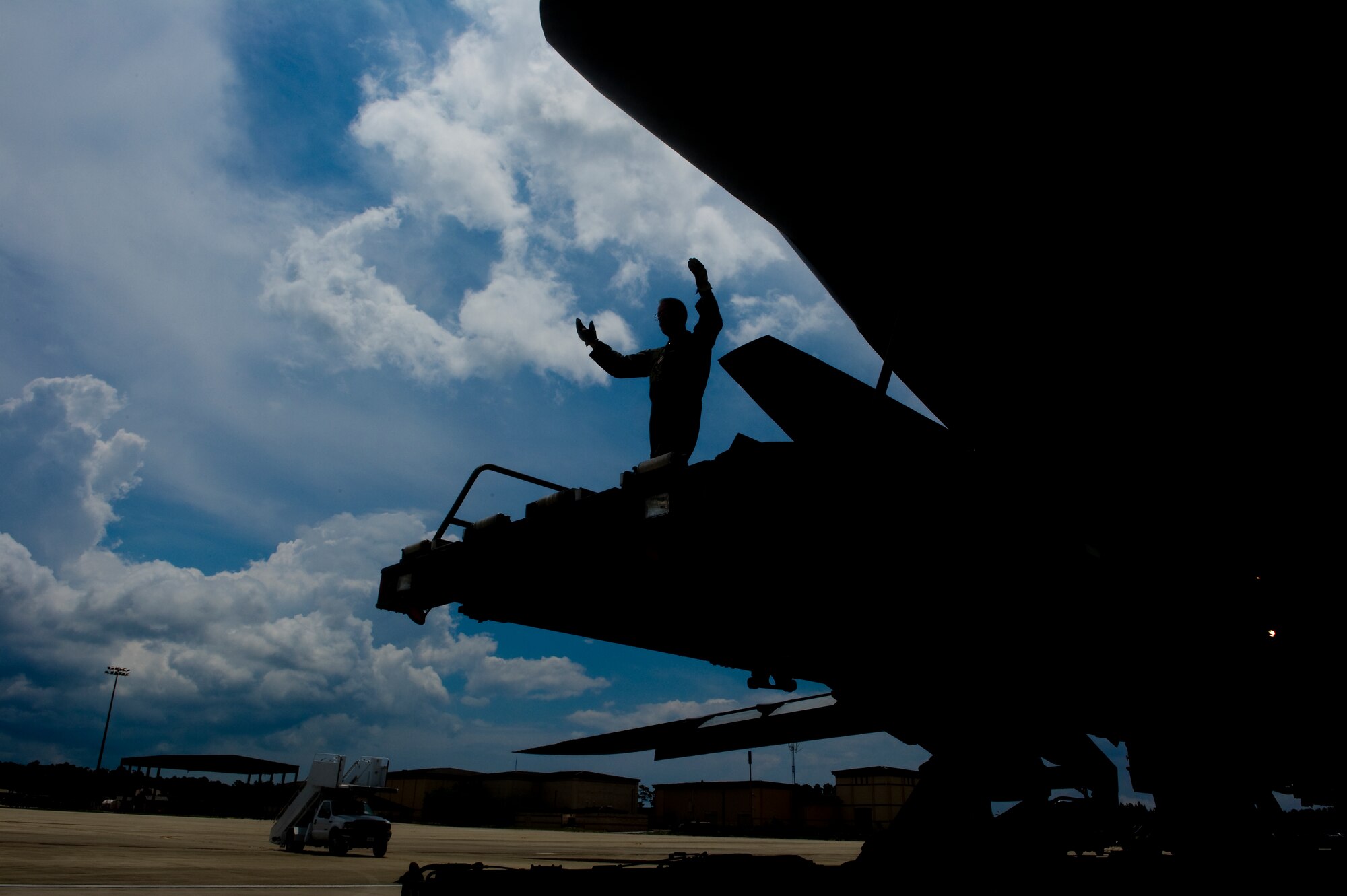 U.S. Air Force Senior Master Sgt. Paul Benson, a C-5 Loadmaster Advisor with the 337th Airlift Squadron out of Dover Air Force Base, Del., directs an annex onto a C-5 Galaxy on the flightline at Hurlburt Field, Fla., June 1st, 2012. Members of the 337th and 1st Special Operations Logistics Readiness Squadron worked together to load the C-5 Galaxy. (U.S. Air Force photo/Airman 1st Class Christopher Williams)(Released)