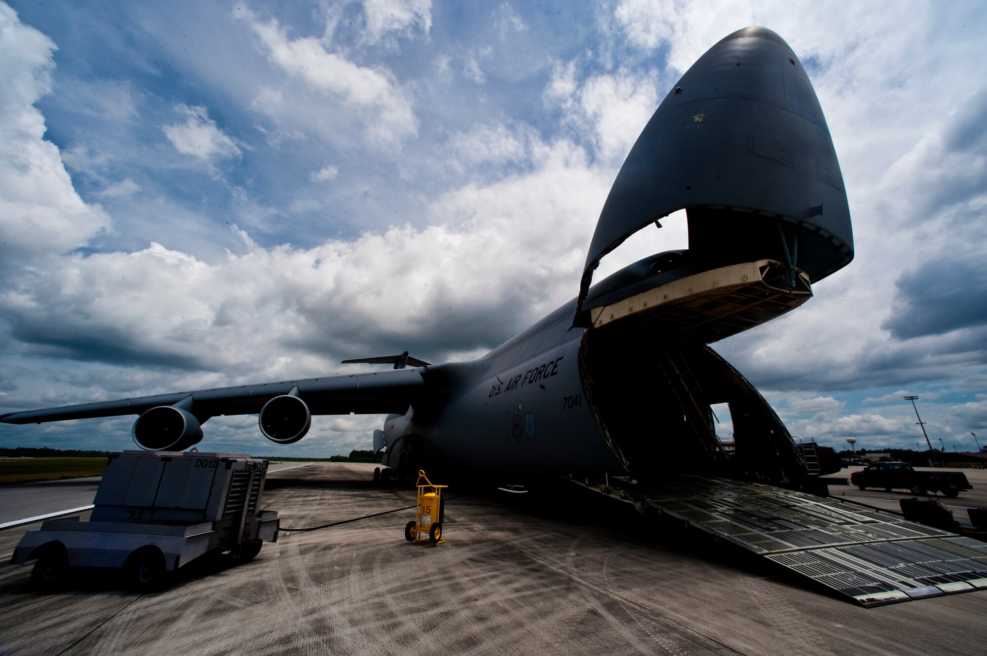 A U.S. Air Force C-5 Galaxy is opened and prepared for loading through the front on the flightline at Hurlburt Field, Fla., June 1st, 2012. The crew is loading a training submarine through the front of the aircraft. (U.S. Air Force photo/Airman 1st Class Christopher Williams)(Released)