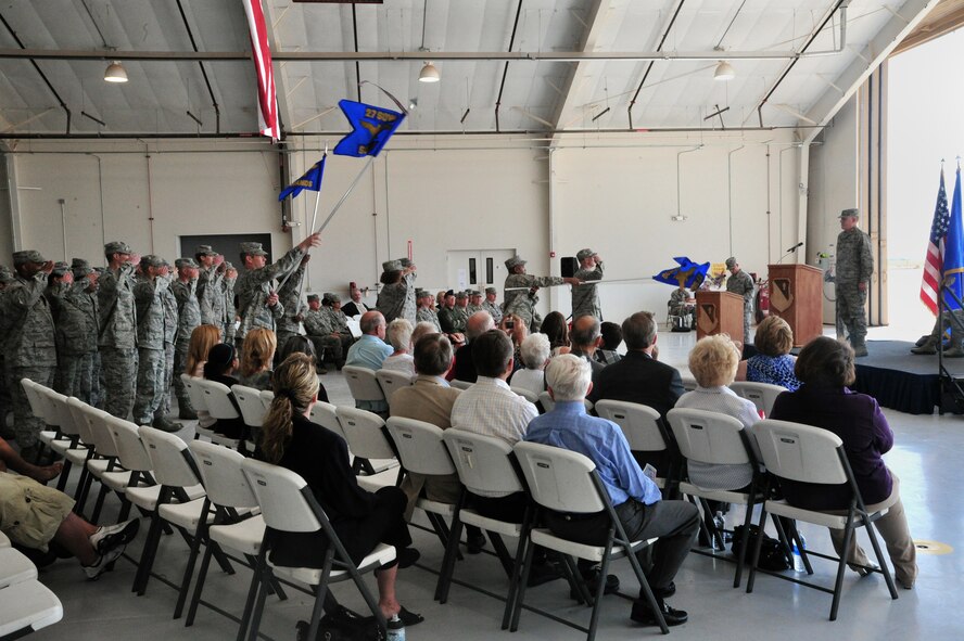 A group formation from the 27th Special Operations Medical Group salutes Col. Jeffrey Gillen, 27th Special Operations Medical Group commander, who assumed command at a ceremony near the flightline at Cannon Air Force Base, N.M., May 31, 2012. Col. Scott Corcoran, 27 SOMDG former commander, relinquished command to Gillen at a ceremony presided over by Col. Buck Elton, 27th Special Operations Wing commander. (U.S. Air Force photo by Airman 1st Class Xavier Lockley)  