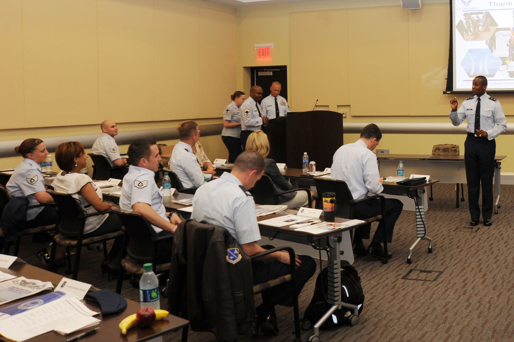 Air Force District of Washington Commander Maj. Gen. Darren W. McDew shares his leadership philosophies with Airmen from the National Capital Region during AFDW’s inaugural Capital Airmen Course May 21-24 at Joint Base Andrews, Md.  The four-day course was focused on developing junior AFDW leaders by educating them and their spouses about the command and the importance of AFDW’s mission.  (U.S. Air Force photo by Aletha Frost)