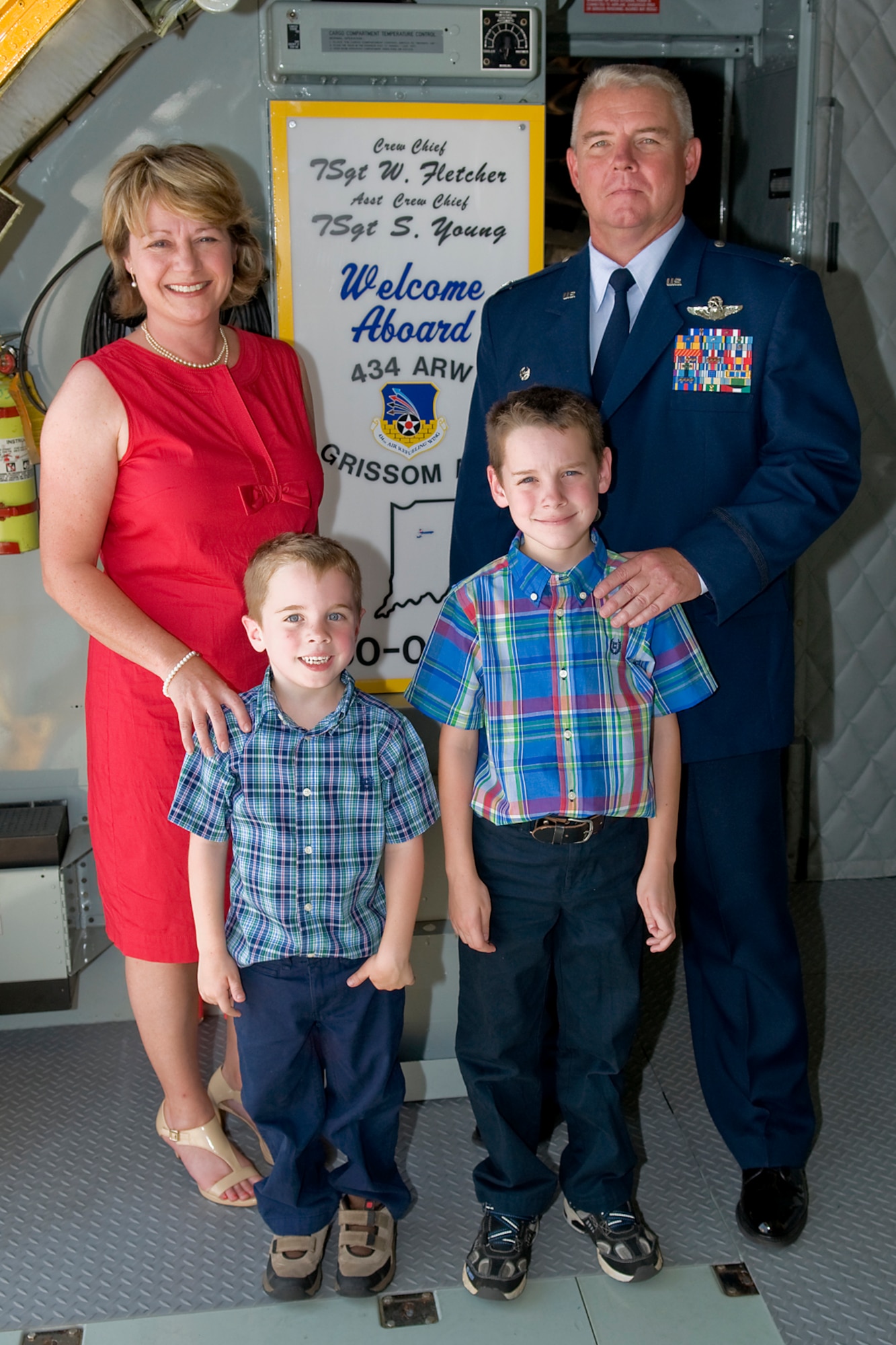 GRISSOM AIR RESERVE BASE, Ind. -- Col. Donald Buckley, 434th Air Refueling Wing commander, poses for a photo on a KC-135R Stratotanker with his wife, Lauri, and their two sons, Jake and Josh, shortly after taking command of the unit May 19.  In his new role, Buckley commands the largest KC-135R unit in the Air Force Reserve Command with over 1,900 military, civilian and contract personnel. (U.S. Air Force photo/Tech. Sgt. Mark R. W. Orders-Woempner)
