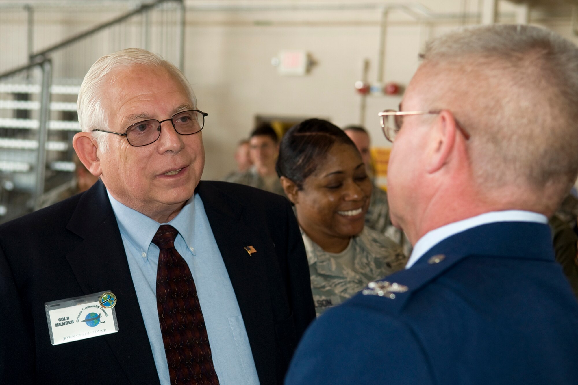 GRISSOM AIR RESERVE BASE, Ind. -- John Stackhouse, a Grissom Community Council member, talks with Col. Donald Buckley in a receiving line shortly after the colonel took command of the 434th Air Refueling Wing here May 19. The GCC is a stand-alone organization made up of civic leaders that support the men and women of Grissom. (U.S. Air Force photo/Tech. Sgt. Mark R. W. Orders-Woempner)
