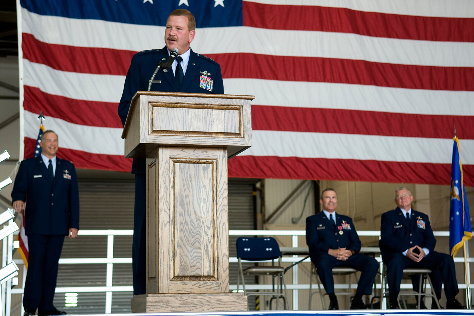 GRISSOM AIR RESERVE BASE, Ind. -- Maj. Gen. Mark Kyle, 4th Air Force commander, talks to Grissom Airmen about Col. Donald Buckley during the colonel?s change of command ceremony here May 19. In his new role as 434th Air Refueling Wing commander, Buckley commands the largest KC-135R unit in the Air Force Reserve Command with over 1,900 military, civilian and contract personnel. (U.S. Air Force photo/Tech. Sgt. Mark R. W. Orders-Woempner)
