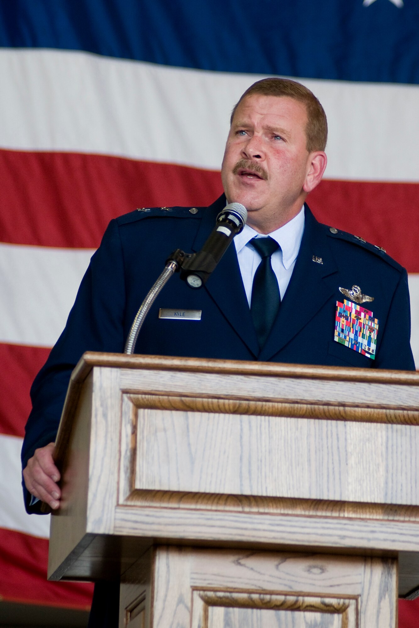 GRISSOM AIR RESERVE BASE, Ind. -- Maj. Gen. Mark Kyle, 4th Air Force commander, talks to Grissom Airmen about Col. Donald Buckley during the colonel?s change of command ceremony here May 19. In his new role as 434th Air Refueling Wing commander, Buckley commands the largest KC-135R unit in the Air Force Reserve Command with over 1,900 military, civilian and contract personnel. (U.S. Air Force photo/Tech. Sgt. Mark R. W. Orders-Woempner)
