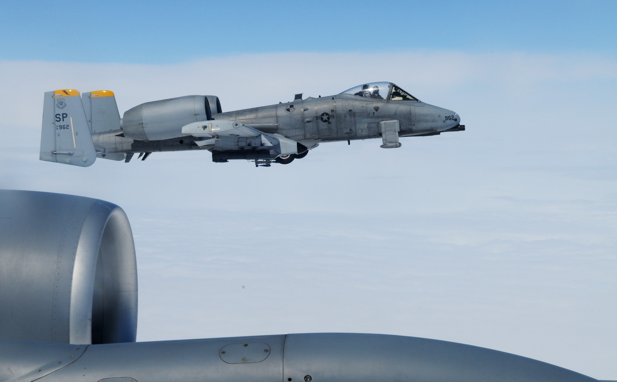 SWEDISH AIR SPACE -- A 52nd Fighter Wing A-10 Thunderbolt II from Spangdahlem Air Base, Germany, flies off the wing of a 100th Air Refueling Wing KC-135 Stratotanker from RAF Mildenhall, England, during Baltic Region Training Event XII, a multinational NATO exercise, May 30, 2012. BRTE XII included support from several countries including the United States, France, Estonia and Latvia. (U.S. Air Force photo/Staff Sgt. Thomas Trower)